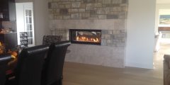 Linear-See-through-fireplace-with-real-stone-facing
